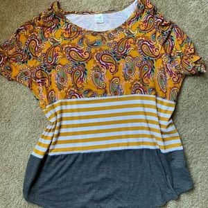 Ladies floral and mustard color block top